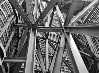 grayscale photography of scafoldings