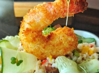 salad with fried shrimp in cafe